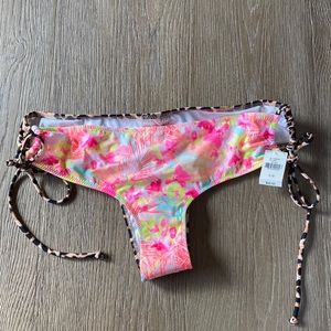VS Side tie bikini bottom. Floral and leopard print.